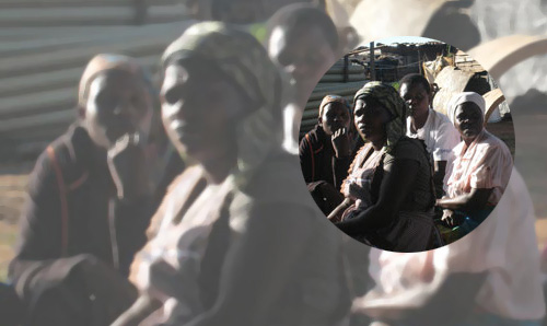 Group of women in a settlement.